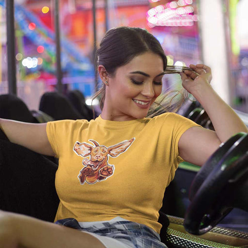 smiling woman wearing a yellow Bella women's t-shirt with the original super vizsla dog design